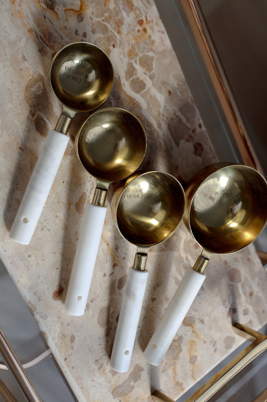 Marble-Handled Gold Measuring Cups