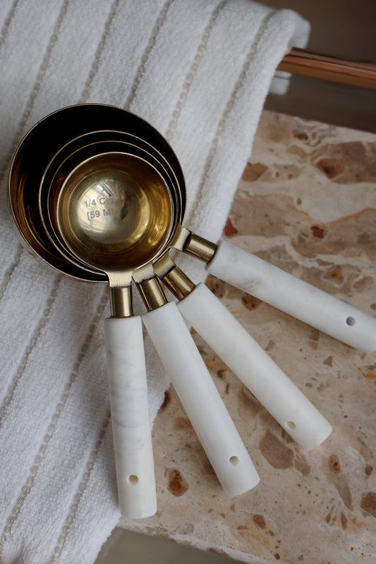 Marble-Handled Gold Measuring Cups