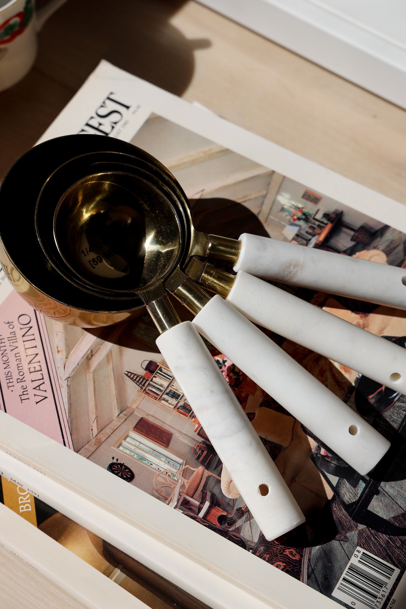 Marble-Handled Gold Measuring Cups